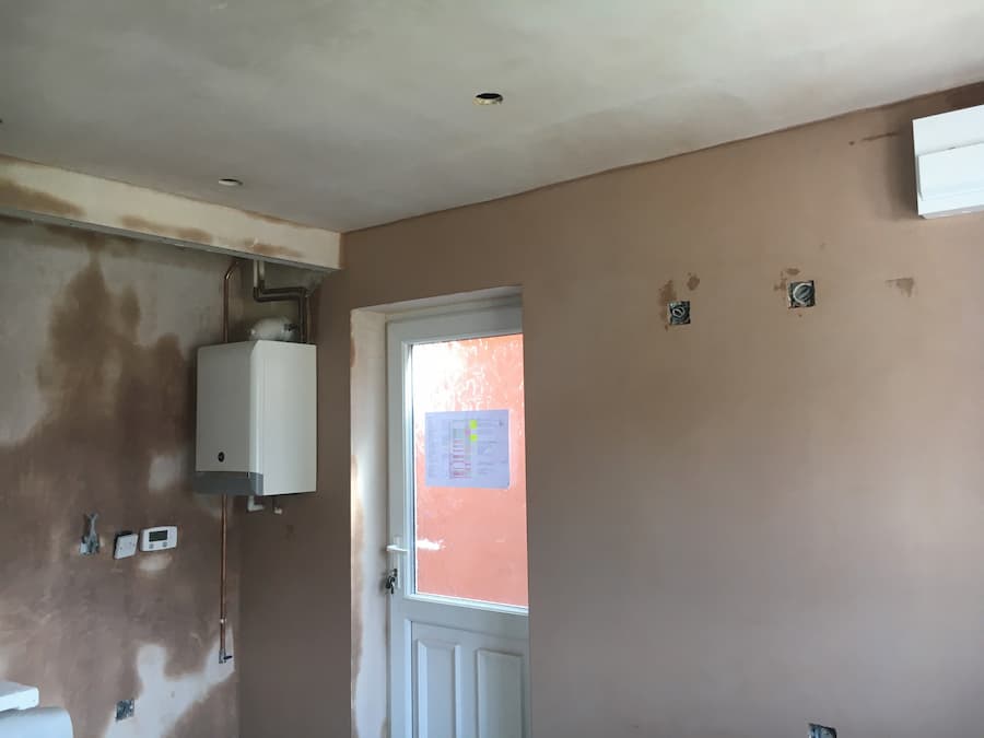 Re-plastered kitchen wall