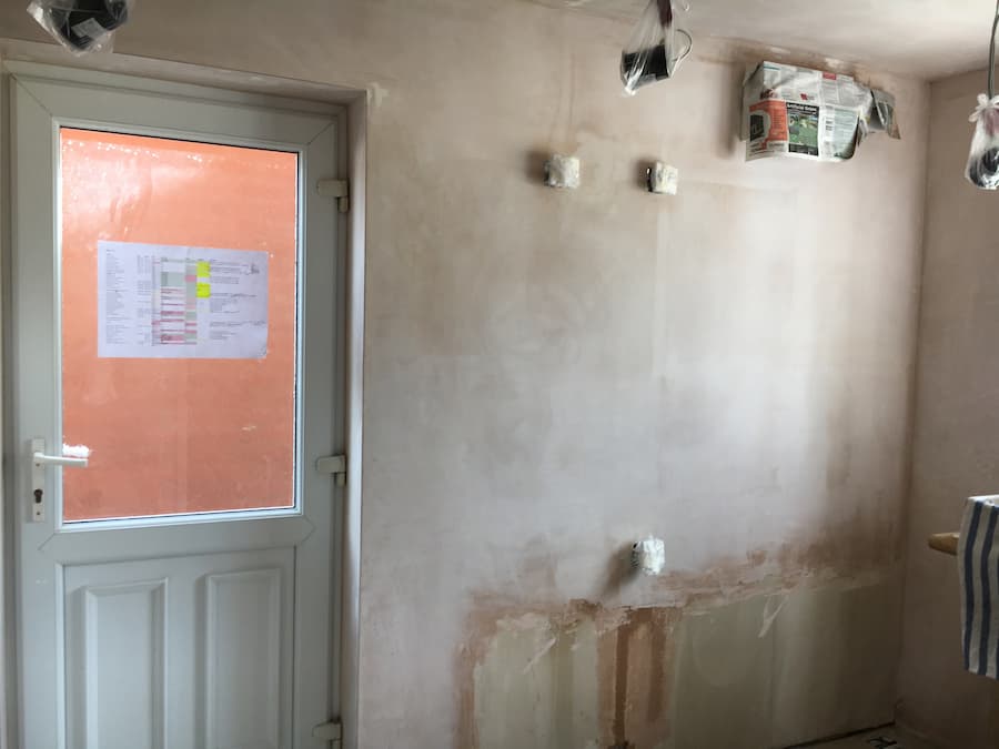 Re-plastered kitchen wall
