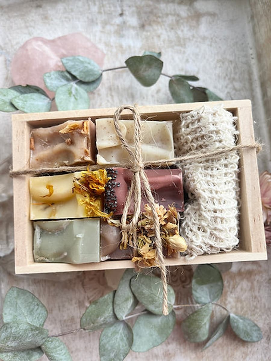 6 luxury handcrafted soaps (50g) and an exfoliating soap pouch beautifully packaged in a stamped wooden crate