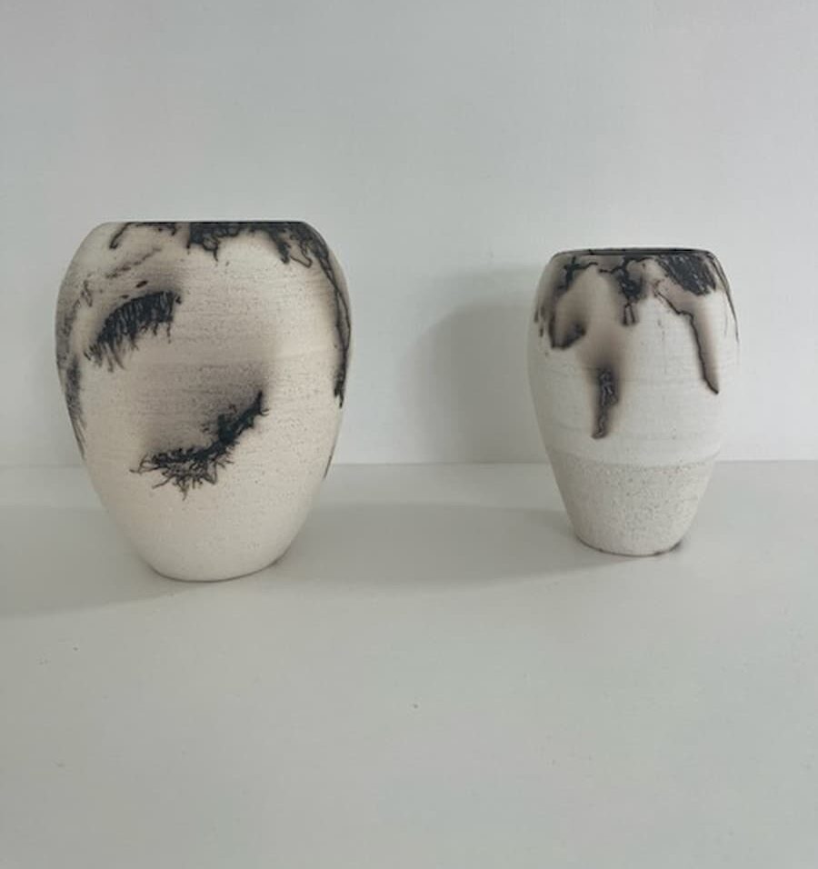 Two raku ceramic vases in off white and black